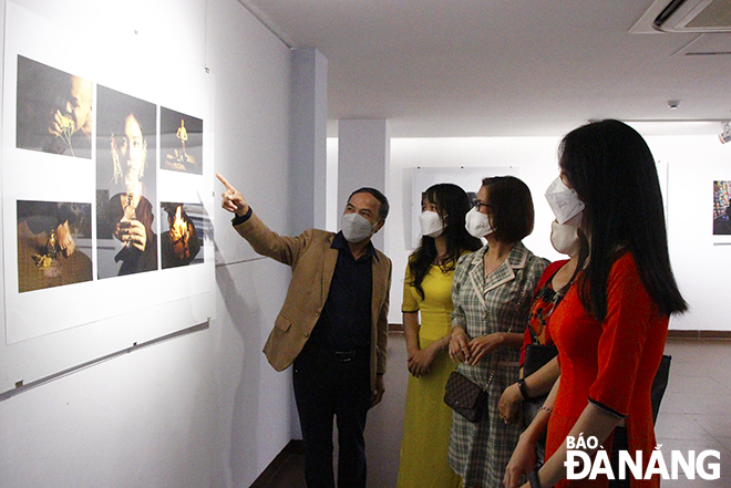  The photos on display at the exhibition were taken by 15 young photographers from Ho Chi Minh City and Thua Thien- Hue Province. Photo: Kieu Phuong