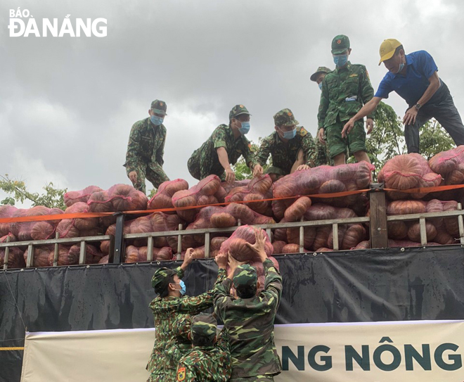 The city’s border guards transporting food to local residents during the 'stay-at-home' period.