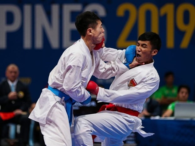 Nguyen Thanh Duy of Vietnam (left) on his way to winning U60kg gold medal at the 30th SEA Games in 2019 in the Philippines. Duy and his teammates will warm-up for the SEA Games at the Southeast Asian championship later this month in Cambodia. (Photo: VNA)