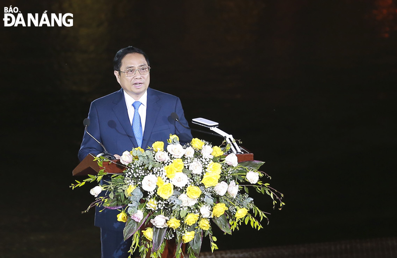 Prime Minister Pham Minh Chinh delivering his opening speech at the event. Photo: THU HA.