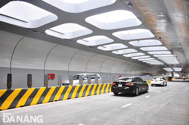 Vehicles travelling in the tunnel. Photo: THANH LAN