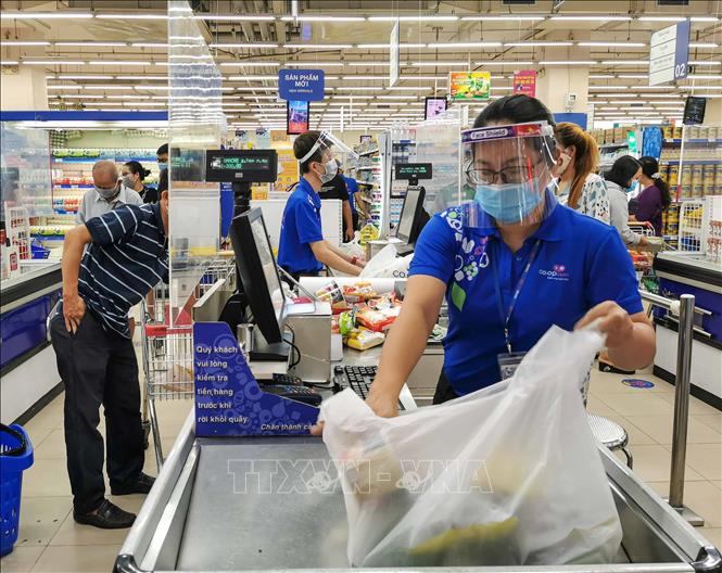 Quầy thanh toán của siêu thị Coopmart Cần Thơ. Ảnh tư liệu: Thanh Liêm/TTXVN
