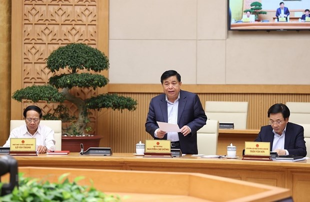 Bộ trưởng Bộ Kế hoạch và Đầu tư Nguyễn Chí Dũng báo cáo tình hình phân bổ giải ngân vốn đầu tư công năm 2022. (Ảnh: Dương Giang/TTXVN)