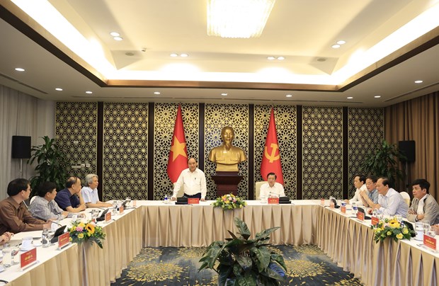 Chủ tịch nước làm việc với Tổ biên tập Ban Chỉ đạo xây dựng Đề án Nhà nước pháp quyền XHCN Việt Nam. (Ảnh: Thống Nhất/TTXVN)