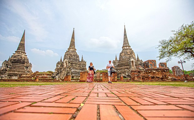 Visitors to the Ayutthaya Historical Park in Ayutthaya province of Thailand. (Photo: Xinhua/VNA)