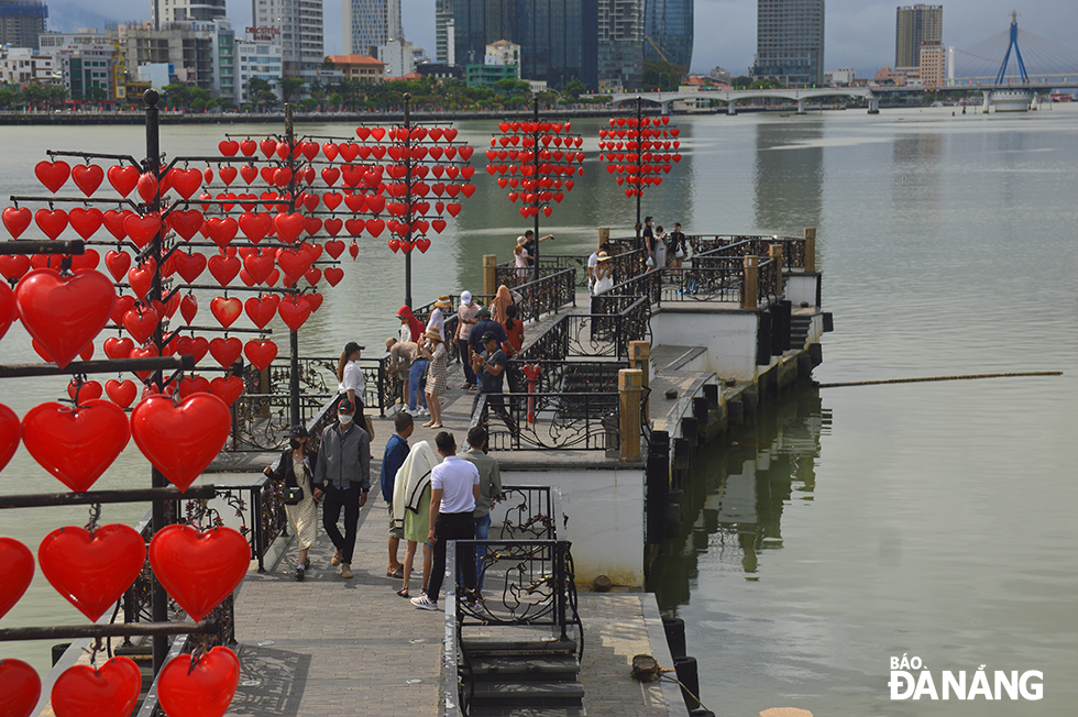 The Bridge of Love attracts many tourists during the holiday.