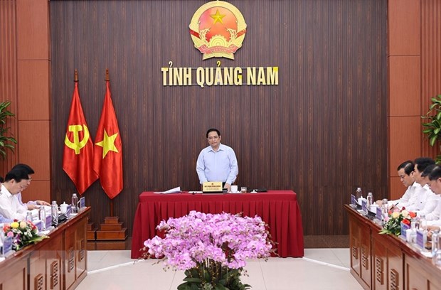 Thủ tướng Phạm Minh Chính chủ trì buổi làm việc với lãnh đạo chủ chốt tỉnh Quảng Nam hồi tháng 3. (Ảnh: Dương Giang/TTXVN)