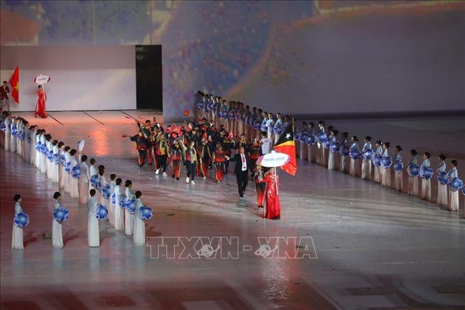 Đoàn thể thao Timor Leste diễu hành tại SVĐ Quốc gia Mỹ Đình trong Lễ khai mạc SEA Games 31. Ảnh: Phạm Hậu/TTXVN