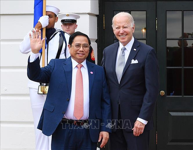Tổng thống Hoa Kỳ Joseph Robinette Biden Jr. đón Thủ tướng Phạm Minh Chính. Ảnh: Dương Giang/TTXVN