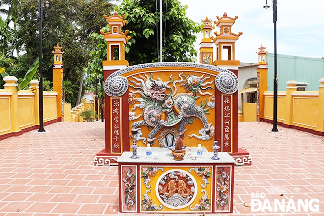 A relief at the Nam O Communal House is meticulously carved. Photo: X. DUNG