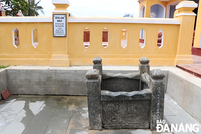 The Lang Well was restored on the principle of preserving the original value for locals to continue to use and make itsefl a new tourist attraction. Photo: X. DUNG