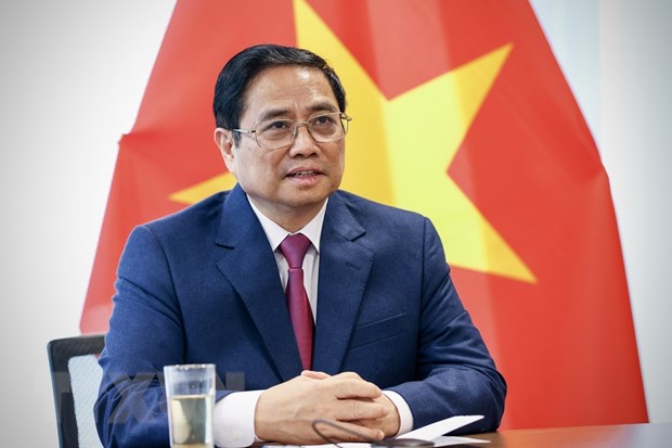 Thủ tướng Phạm Minh Chính điện. (Ảnh: Dương Giang/TTXVN)