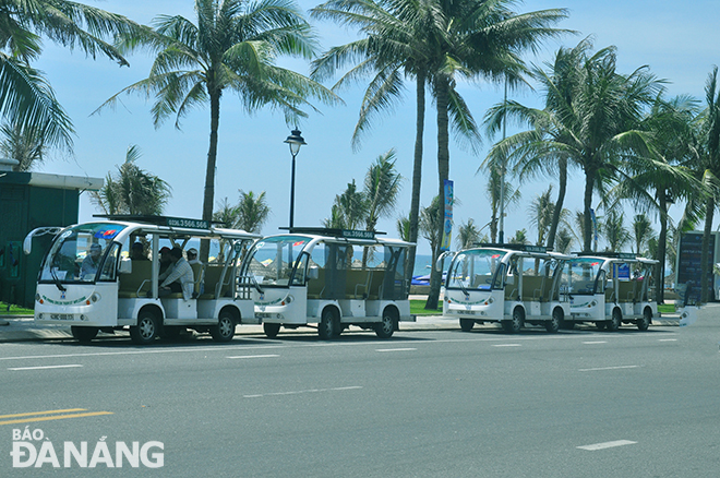 Electric vehicles are seen travelling along a local street.  Photo: THANH LAN