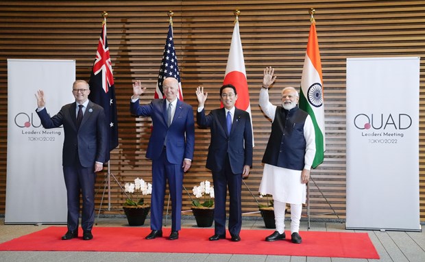 Leaders of the Quad countries pose for a group photo. (Photo: Kyodo/VNA)