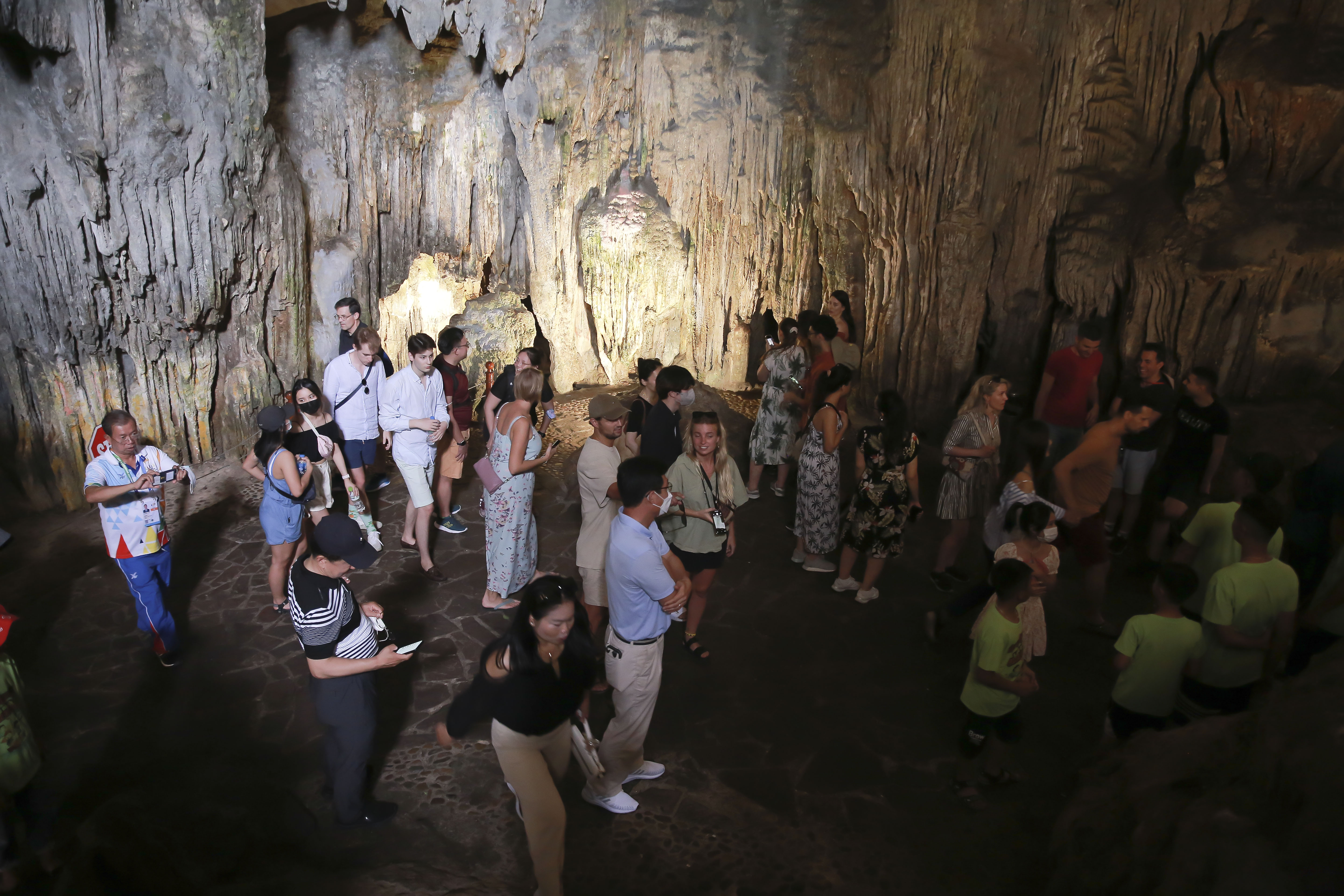 Visitors at the Sung Sot Cave located on Bo Hon Island. This is one of the most beautiful caves in Ha Long Bay.