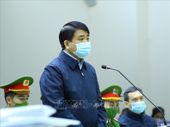 Cựu Chủ tịch UBND thành phố Hà Nội Nguyễn Đức Chung khai báo trước phiên tòa sáng 27/12/2021, trong vụ can thiệp trái pháp luật, tạo điều kiện cho Công ty TNHH Thương mại và Dịch vụ kỹ thuật Nhật Cường (Công ty Nhật Cường) trúng thầu. Ảnh tư liệu: TTXVN