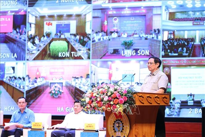 Thủ tướng Chính phủ Phạm Minh Chính gặp gỡ đối thoại với công nhân lao động năm 2022. Ảnh: Dương Giang/TTXVN