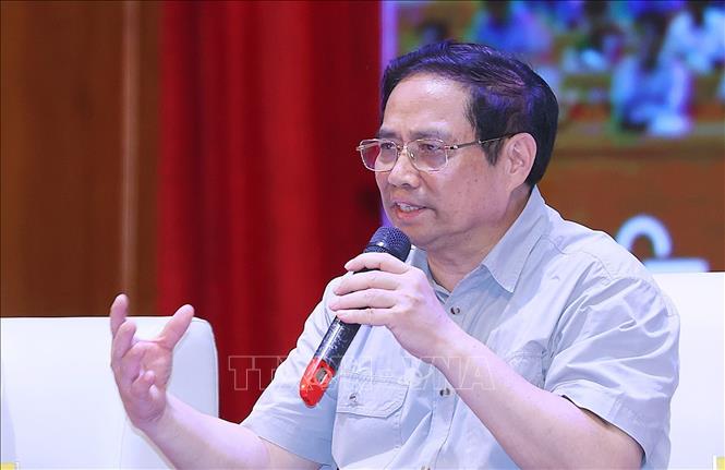 Thủ tướng Phạm Minh Chính đối thoại với công nhân lao động năm 2022. Ảnh: Dương Giang/TTXVN