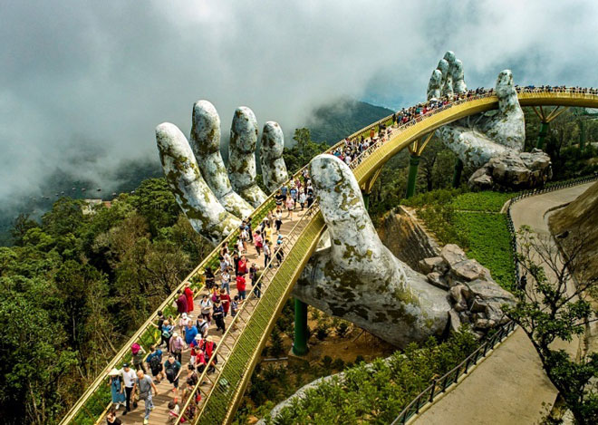  The Cau Vang (Golden Bridge) on the top of Da Nangs Ba Na Hills The Cau Vang (Golden Bridge) on the top of Da Nangs Ba Na Hills