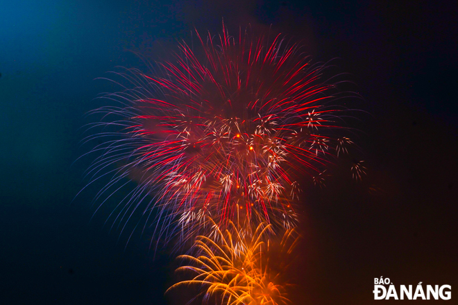 Fireworks burst over the Sun Wheel