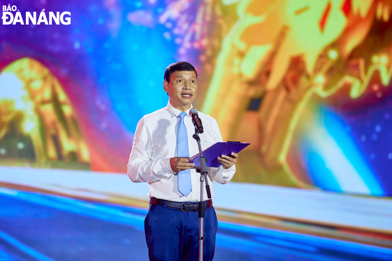 Municipal People's Committee Vice Chairman Ho Ky Minh speaking at the event