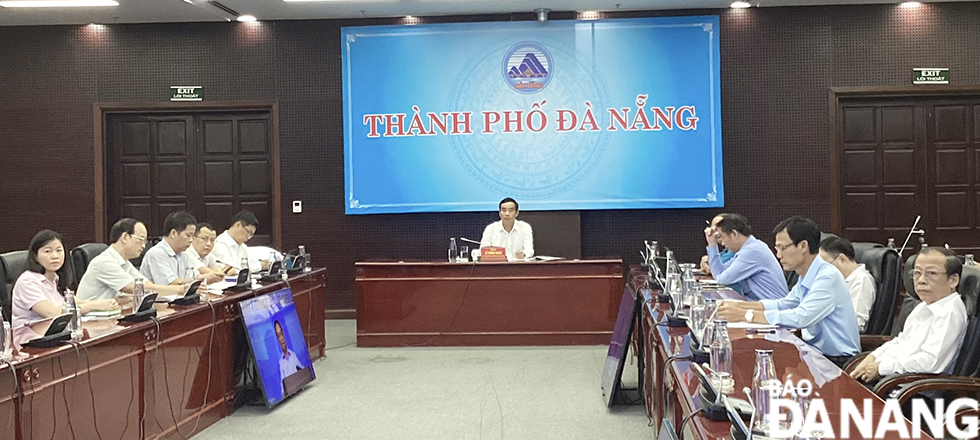 Quang cảnh điểm cầu thành phố Đà Nẵng tham dự hội nghị do Chủ tịch UBND thành phố Lê Trung Chinh chủ trì. Ảnh: TRIỆU TÙNG