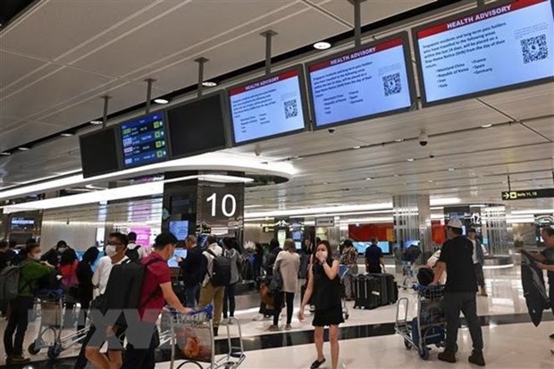 At the Changi Airport (Photo: AFP/VNA)