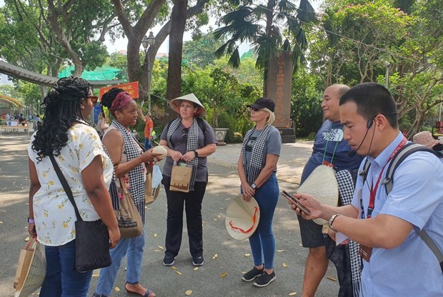 Tourists in Ho Chi Minh City (Photo: VNA)