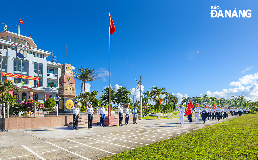 A flag salute ceremony on the Song Tu Tay Island