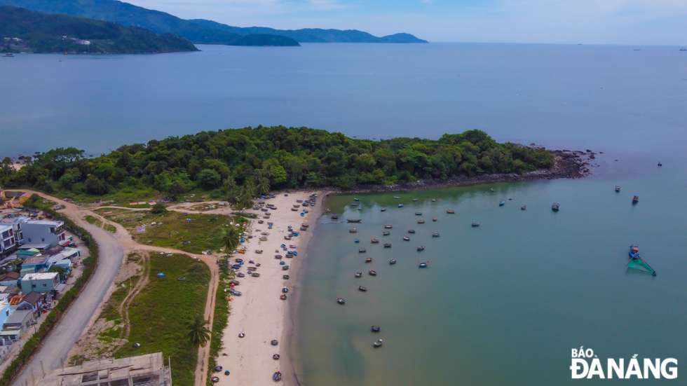 Nam O coastal village and Nam O reef seen from above. This is a place with a long-standing cultural identity, traditional fish sauce making and unspoiled natural landscape completely suitable for tourism development.