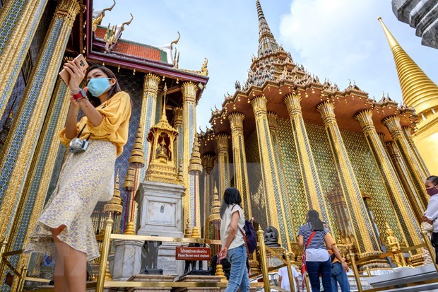 Tourists at the Grand Palace in Bangkok, Thailand (Photo: AFP/VNA)