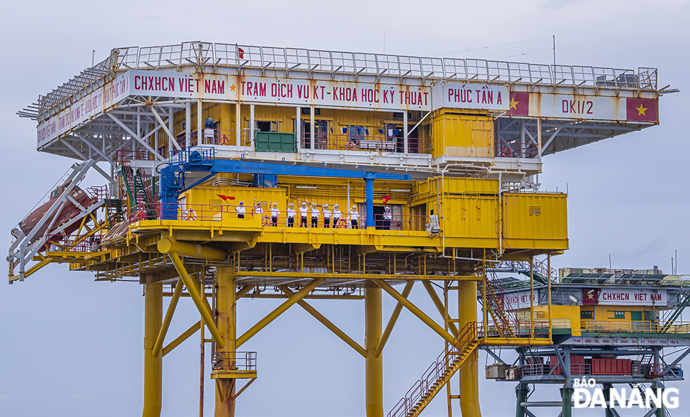 The rig stands in the middle of the ocean