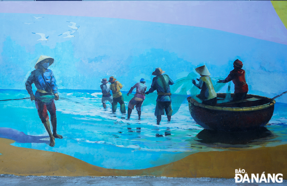 The painting of fishermen gradually walking backwards to pull in fishing nets. Photo: T.K