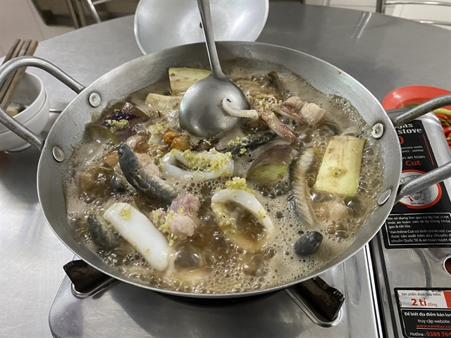 The unique flavor of fermented fish hotpot comes from the combination of all the ingredients with uminal flavor broth. — VNS Photo Hong Linh