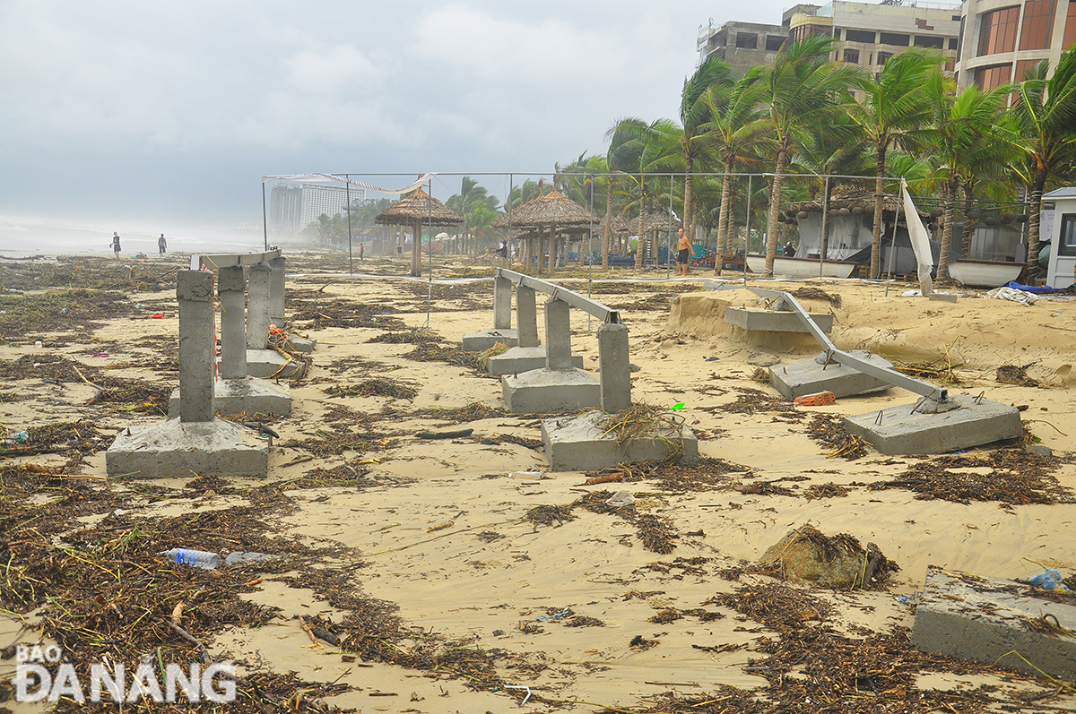 Anti-wave concrete pillars were also knocked over.