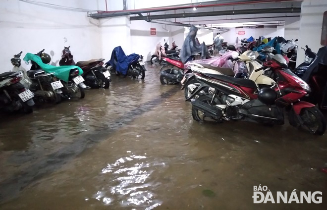 A parking basement in an apartment building in Son Tra District was inundated