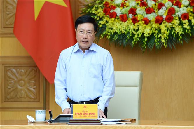 Phó Thủ tướng Thường trực Chính phủ Phạm Bình Mình vừa ký ban hành Nghị định quy định về nghỉ hưu ở tuổi cao hơn đối với cán bộ, công chức giữ chức vụ lãnh đạo, quản lý. Ảnh: TTXVN