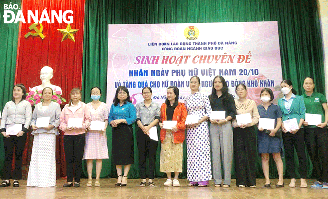 The trade union of the education sector organized thematic activities and presented gifts to disadvantaged female union members and teachers on the occasion of Vietnamese Womens Day