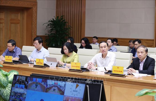Các thành viên Ban Chỉ đạo quốc gia phòng, chống dịch COVID-19 tham dự phiên họp tại điểm cầu Chính phủ. Ảnh: Dương Giang/TTXVN