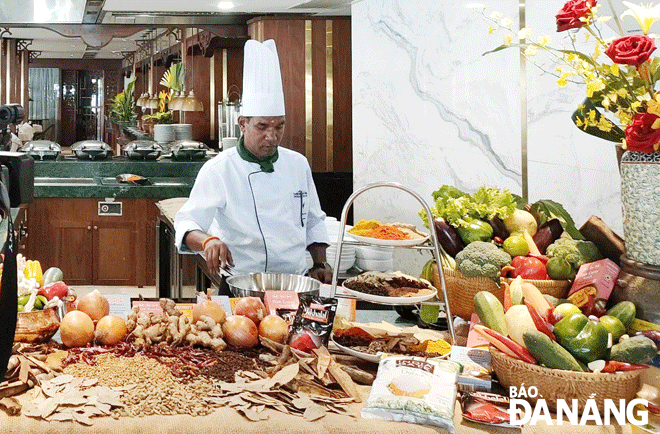 An Indian chef at the Furama Resort Danang is preparing food for guests. Photo: THU HA