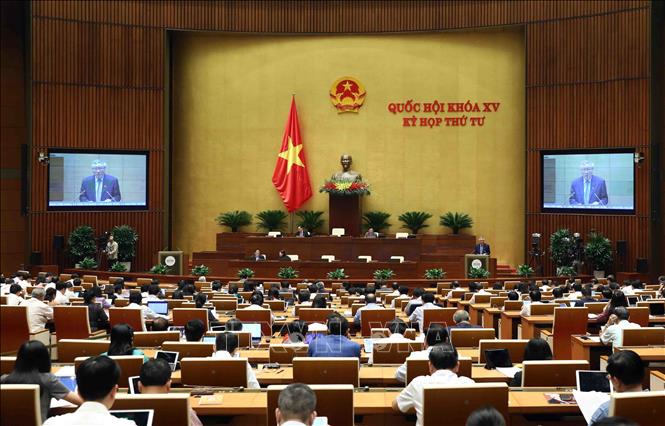 Chánh án Tòa án nhân dân tối cao Nguyễn Hòa Bình trình bày Báo cáo công tác năm 2022 của Chánh án Tòa án nhân dân tối cao. Ảnh: TTXVN