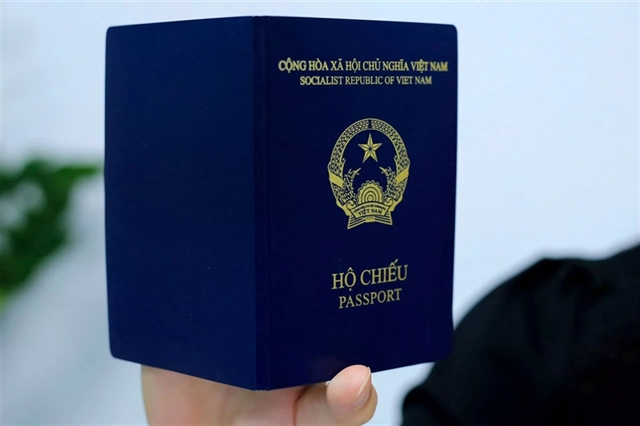 Viet Nam's new passports with navy blue covers. — Photo from Viet Nam Government Portal