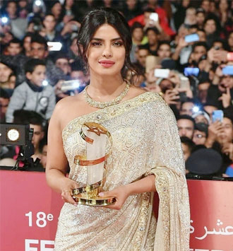 Nghệ sĩ đầu tiên của Ấn Độ - Priyanka Chopra được vinh danh vì những cống hiến cho điện ảnh Ấn Độ và thế giới tại LHP quốc tế Marrakech năm 2019. Ảnh: AFP