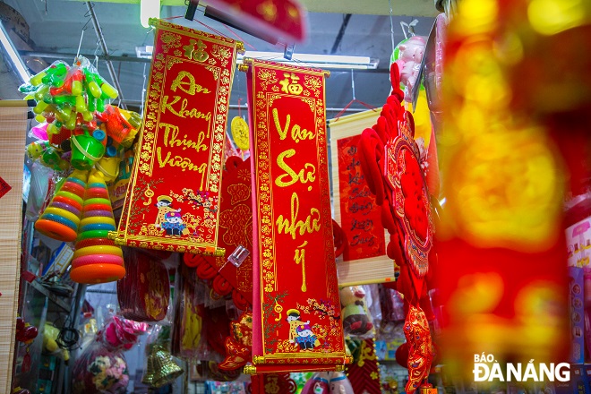 Decorations for the upcoming Lunar New Year are on display at groceries and stationery stalls