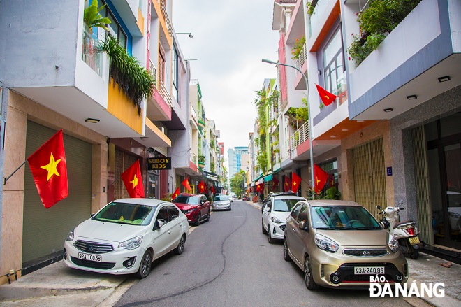 Small alleys in Da Nang are adorned with Vietnamese flags as residents get into the festive spirit and prepare to welcome in the New Year