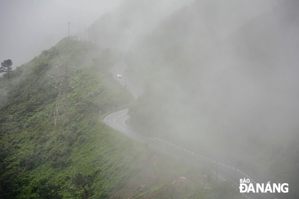 The Hai Van Pass, standing about 500m above sea level, is shrouded in clouds and mist.