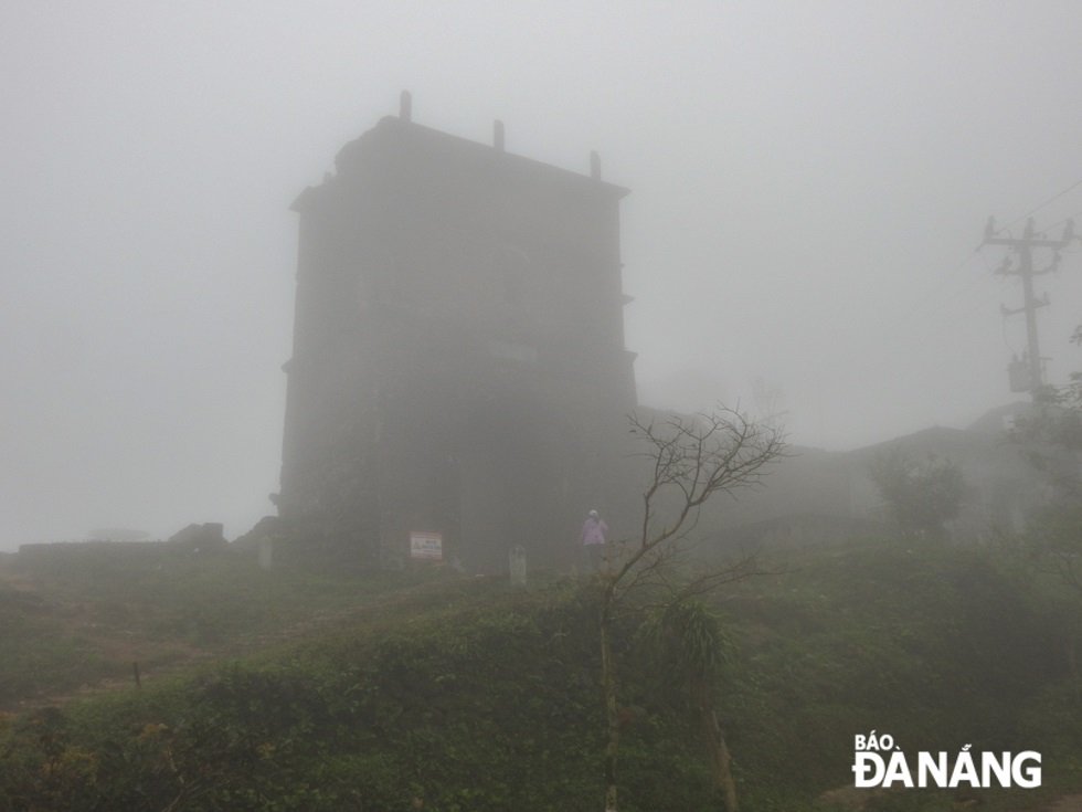 The Hai Van Gate is covered in clouds.