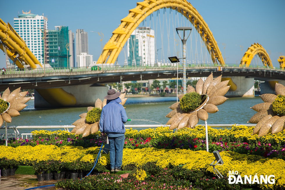 The flower street is watered and cared for by construction units in order to keep flowers fresh and brilliant.