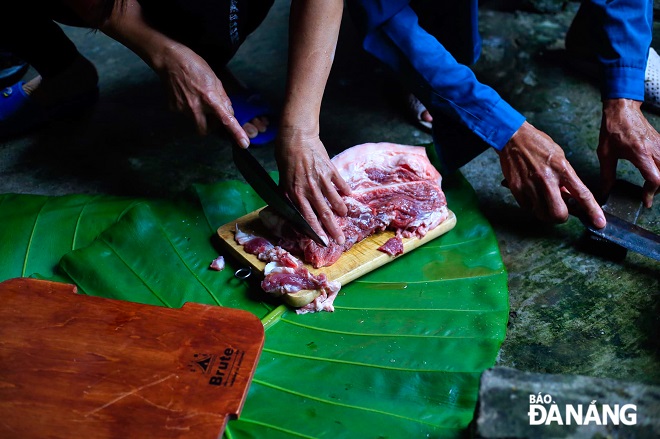 Pork is purchased by the group at supermarkets to ensure quality.
