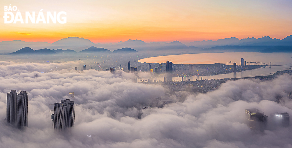 A scudding sea of clouds embracing a part of Da Nang.